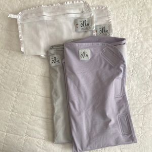 Two “The Ollie” swaddles and wash bags.
